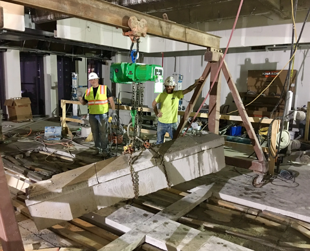 Interior concrete demolition in occupied building — controlled removal (1)